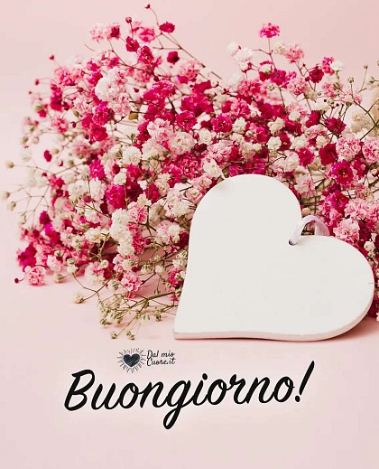 Cuore rosso elegante e luminoso che risalta su uno sfondo morbido con la scritta affettuosa Buongiorno!